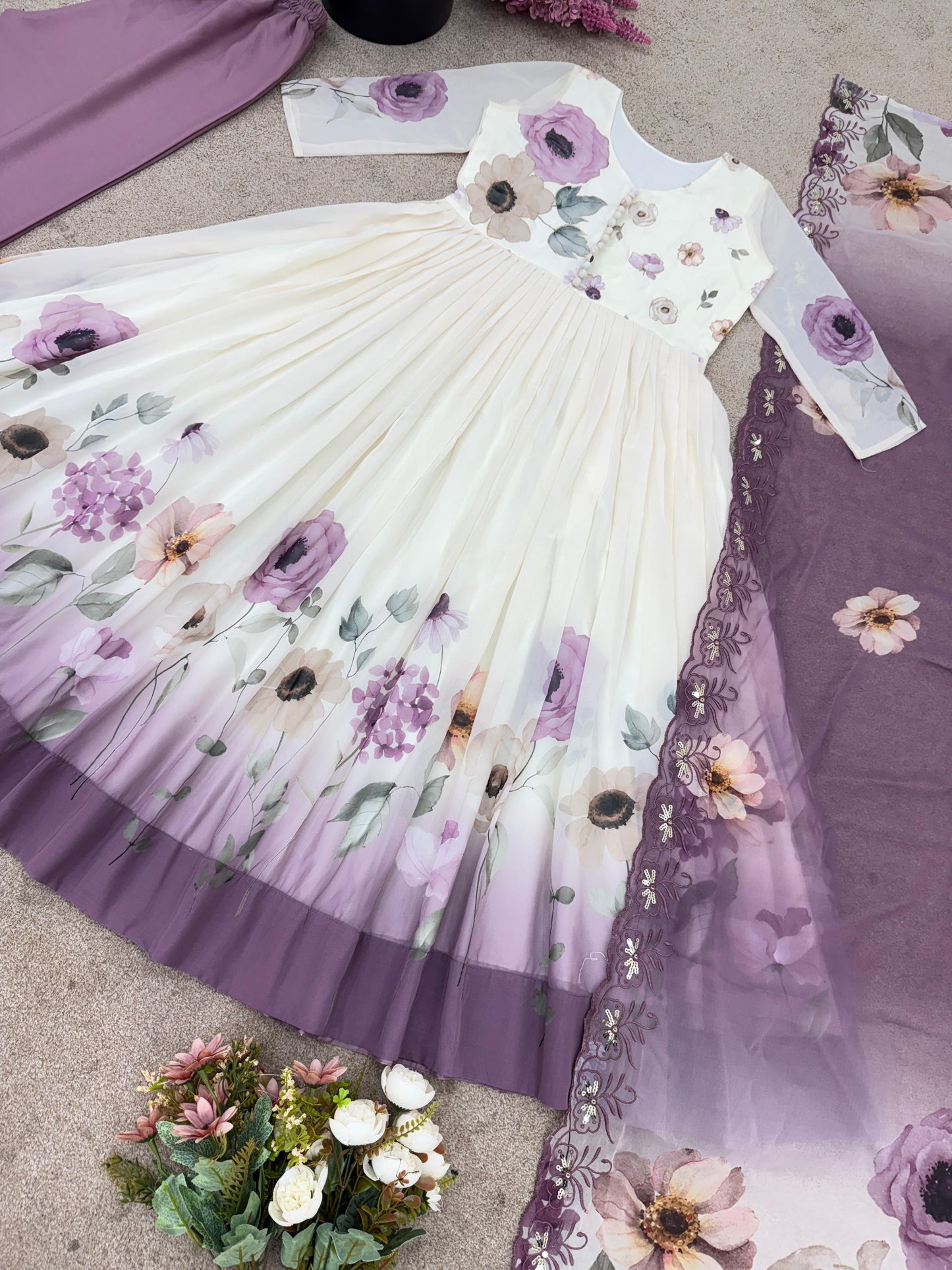 🌸 Product Name:

✨ “Elegance Bloom – Embroidered Georgette Flair Gown Set”