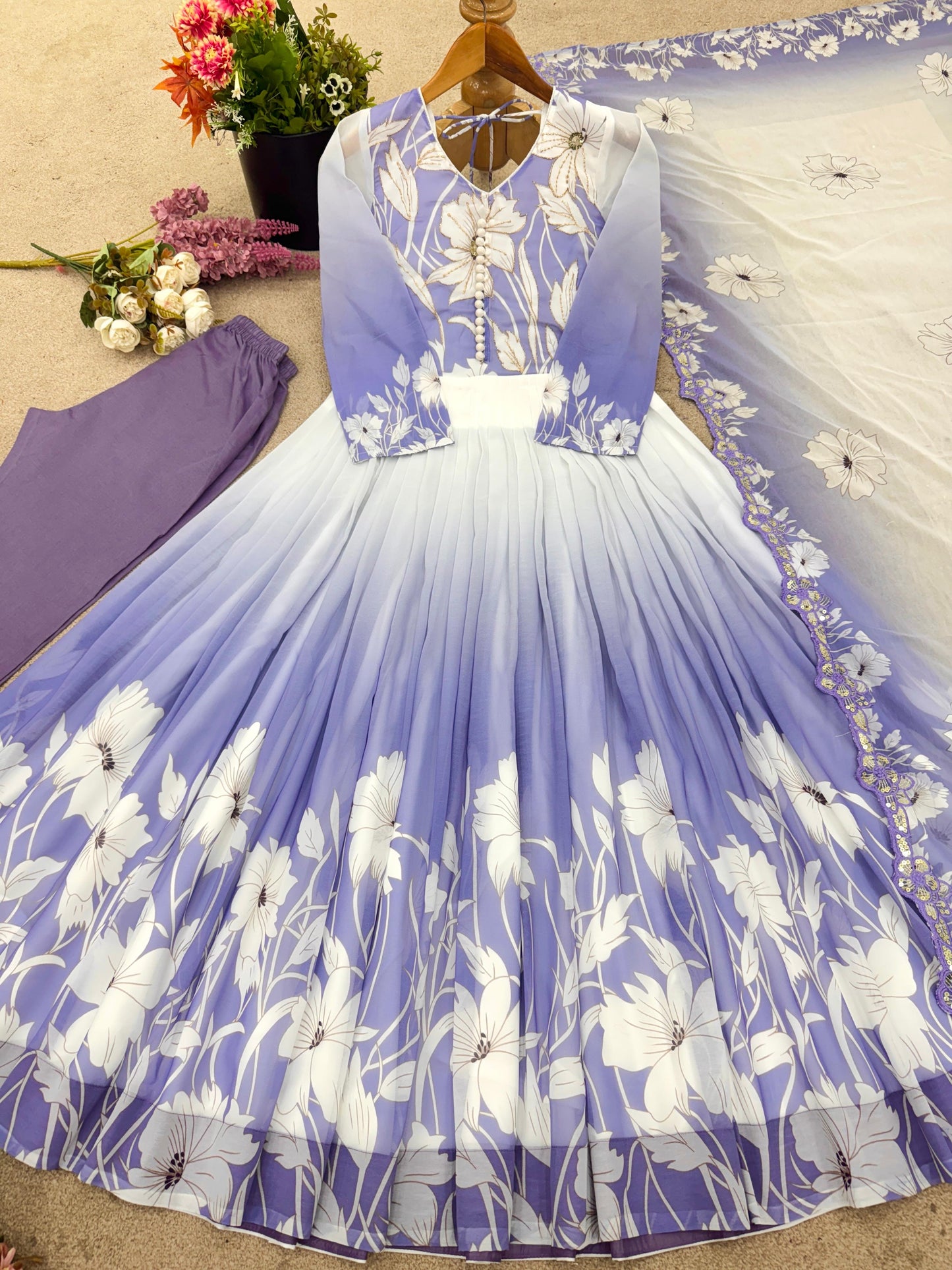 🌸 Product Name:

✨ “Elegance Bloom – Embroidered Georgette Flair Gown Set”